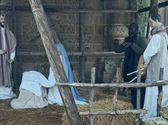 An image collage containing 1 images, Image 1 shows Nativity scene with a Ghanaian citizen in Galatone, Italy