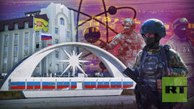 ‘Where the Russian flag is raised, it will not be lowered’: Inside the life of the nuclear city near the front line