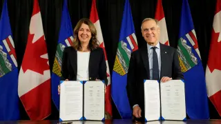 Canadian Prime Minister Mark Carney and Alberta Premier Danielle Smith following the signing of a Memorandum of Understanding (MOU) in Calgary, Alberta.