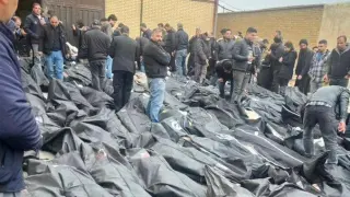 Bodies of Iranian protesters piled up in a makeshift morgue.