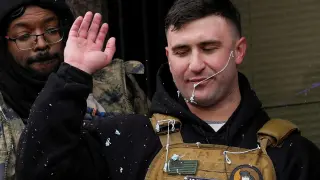 Anti-Islam 'ultra' influencer Jake Lang gestures during his March Against Fraud in Minnesota amid accusations of fraud among the state's large Somali-American community, in Minneapolis, Minnesota (USA).